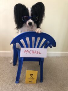 Michael-Papilon-Sitting on chair. 