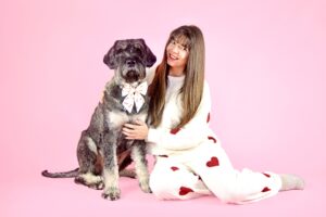 Jurgen the Giant Schnauzer posing with owner